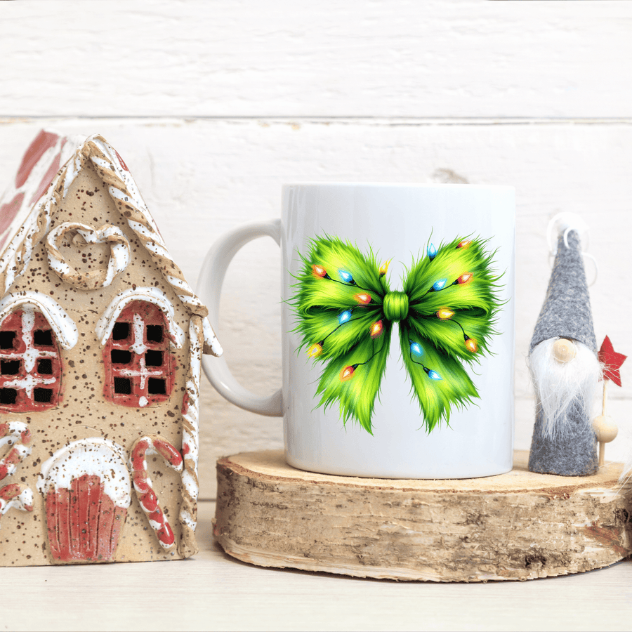 Festive Green Bow Christmas Mug – Holiday Coffee Cup with Colorful Lights Design